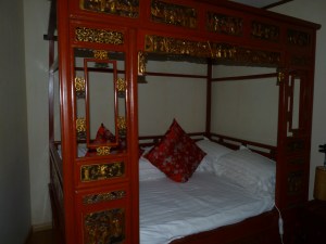 My bed at the Zen Garden Hotel, Lijiang